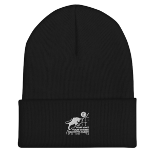 A black beanie with a white dog on it